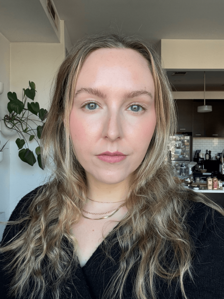 Image may contain Blonde Hair Person Face Head Photography Portrait Adult Happy Smile Body Part and Neck