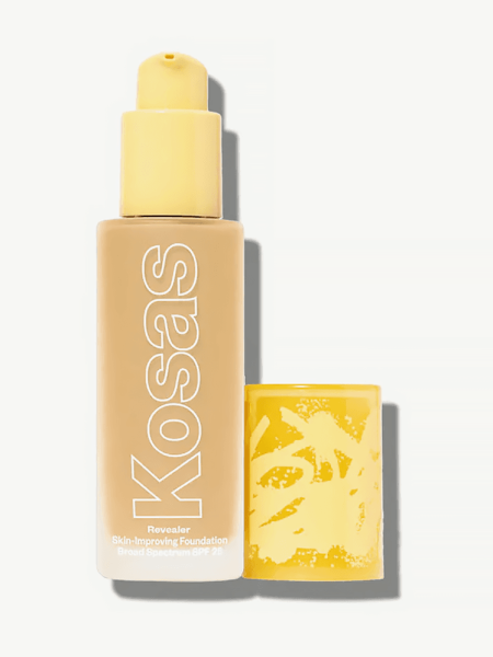 Revealer Skin Improving Foundation SPF 25 in branded clear bottle with yellow pump on light gray background